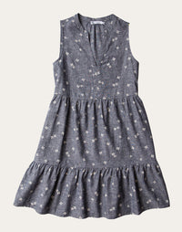 Sleeveless tiered midi dress with small white floral print on navy background