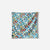 Square bandana towel with colorful floral pattern featuring small flowers on teal background