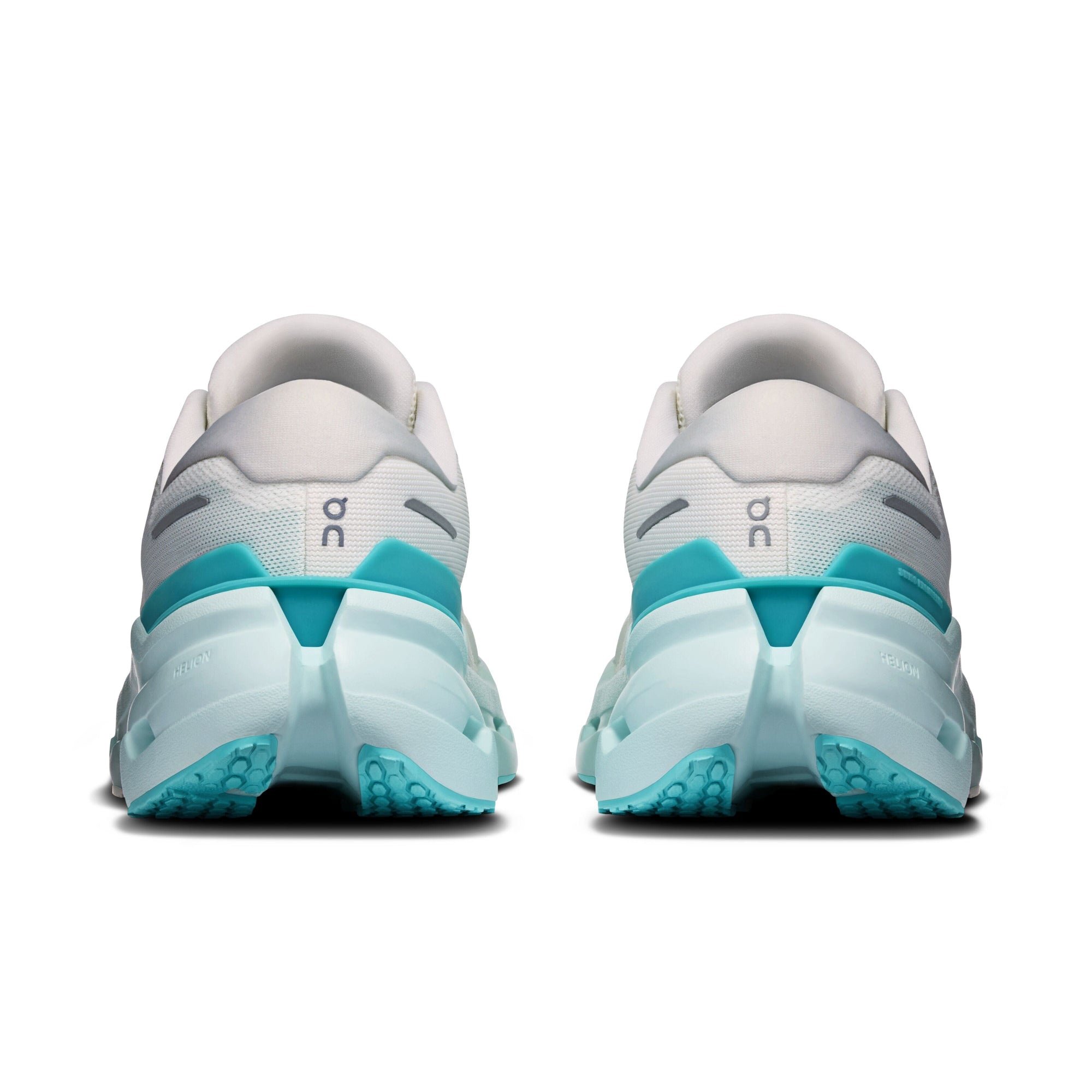 Rear view of women's running shoes with white upper and teal aquamarine chunky midsole