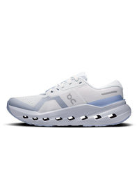 Women's running shoe with white mesh upper, light blue accents, and chunky cushioned sole with cutout pods, side view