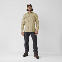 Light tan long-sleeve button-up shirt with chest pockets on male model