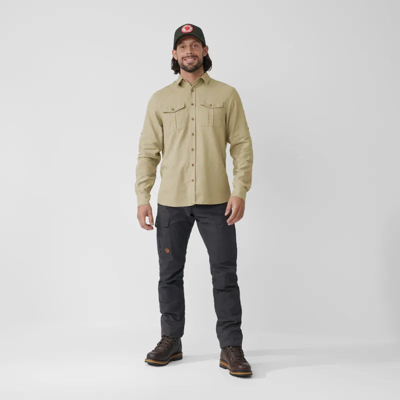 Light tan long-sleeve button-up shirt with chest pockets on male model