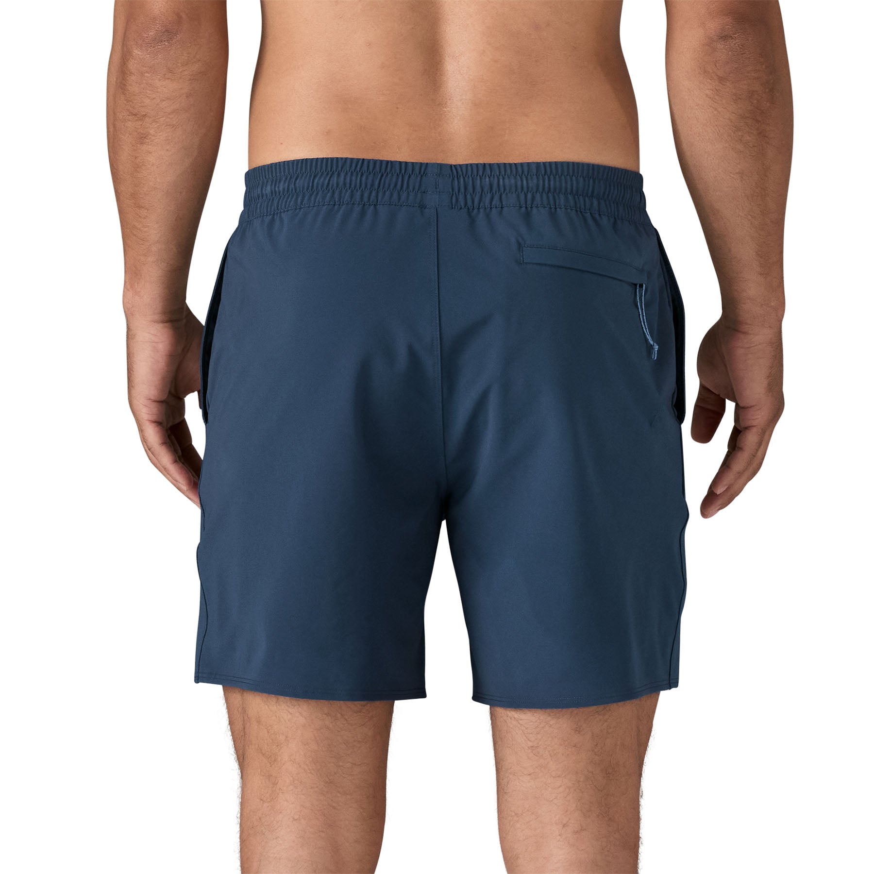 Dark teal athletic shorts with elastic waistband and side pockets, back view