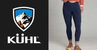 Women's fitted fleece tights in dark navy, front on-model view with side pockets