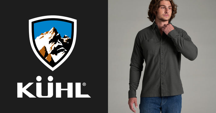 Men's long-sleeve button-up shirt in dark charcoal, front view on model
