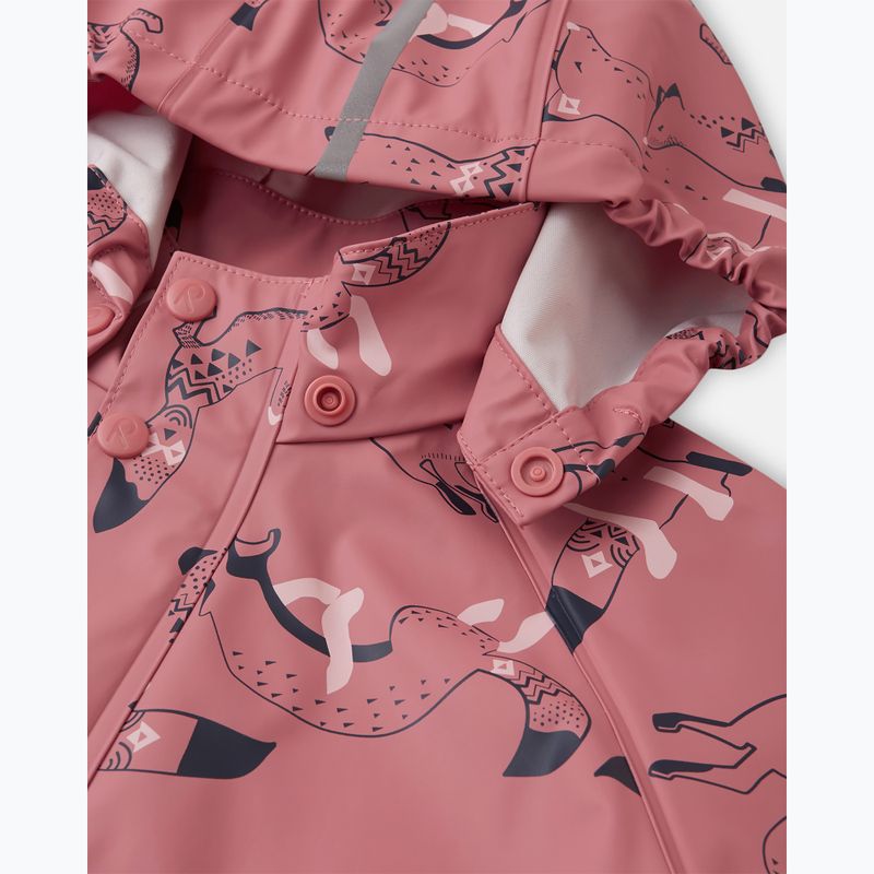 Close-up of pink hooded rain jacket with navy animal print, snap buttons, and reflective detail