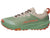 Trail running shoe with green mesh upper and tan overlays, side profile view