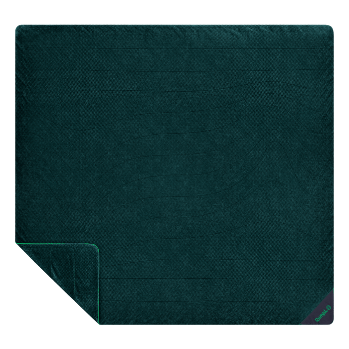 Large two-person fleece blanket in deep teal, flat lay view with corner folded back