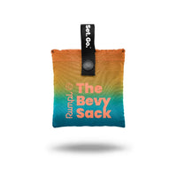 Compact packable bag with rainbow gradient, snap closure, and black hanging strap, front view