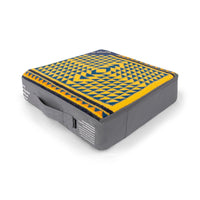 Geometric patterned wool blanket in yellow and teal, folded inside a gray zippered travel case