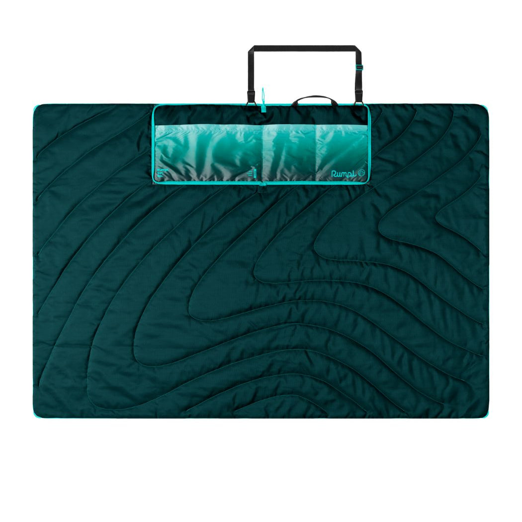 Large quilted outdoor mat in teal green with curved wave pattern and carry handle