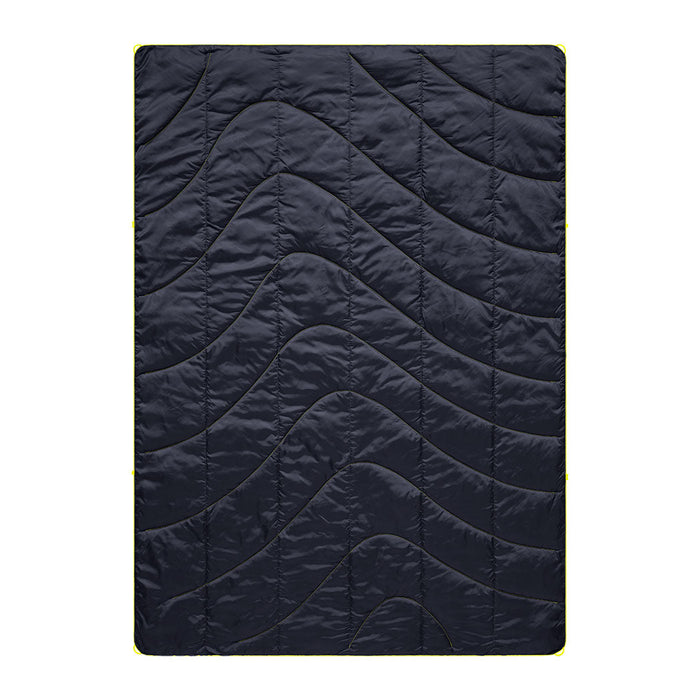 Dark blue quilted camping blanket with curved wave pattern stitching, flat overhead view