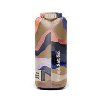 Packable sleeping bag in stuff sack with abstract coral and navy mountain pattern