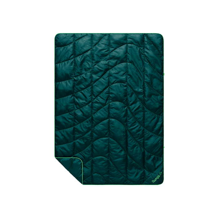 Dark teal quilted travel blanket with wave pattern stitching and bright green border trim