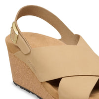 Women's nubuck leather wedge sandal with crossover straps and ankle buckle closure