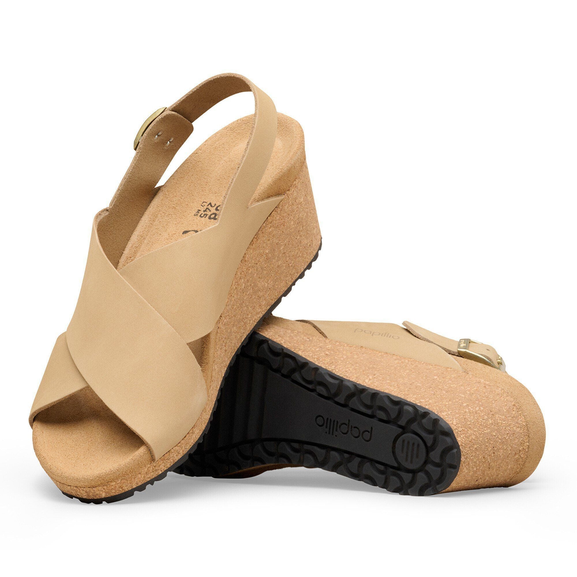 Beige nubuck leather wedge sandals with ankle strap and cork sole, side angle view