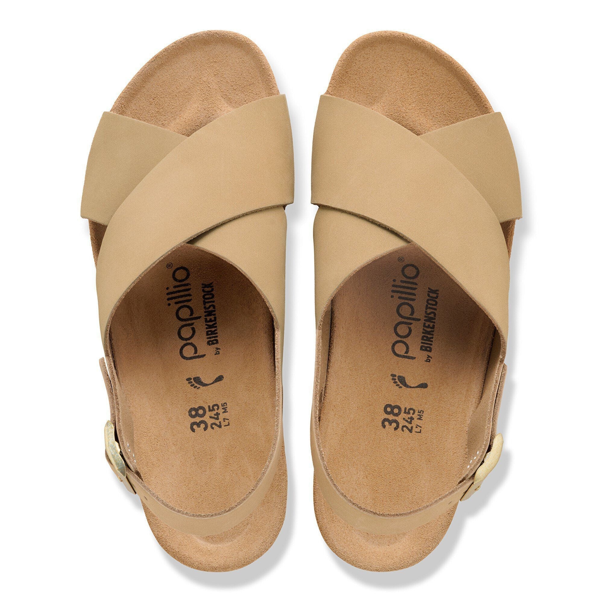 Light tan leather sandals with crossed straps and cork footbed, top view