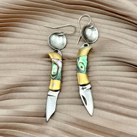 Pair of dangle earrings shaped like mini folding pocket knives with iridescent abalone shell handles