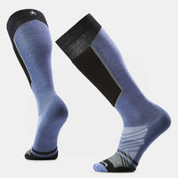 Over-the-calf ski socks in blue and black, shown from front and back angles