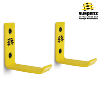 Two yellow L-shaped wall mount hooks with mounting holes for storage