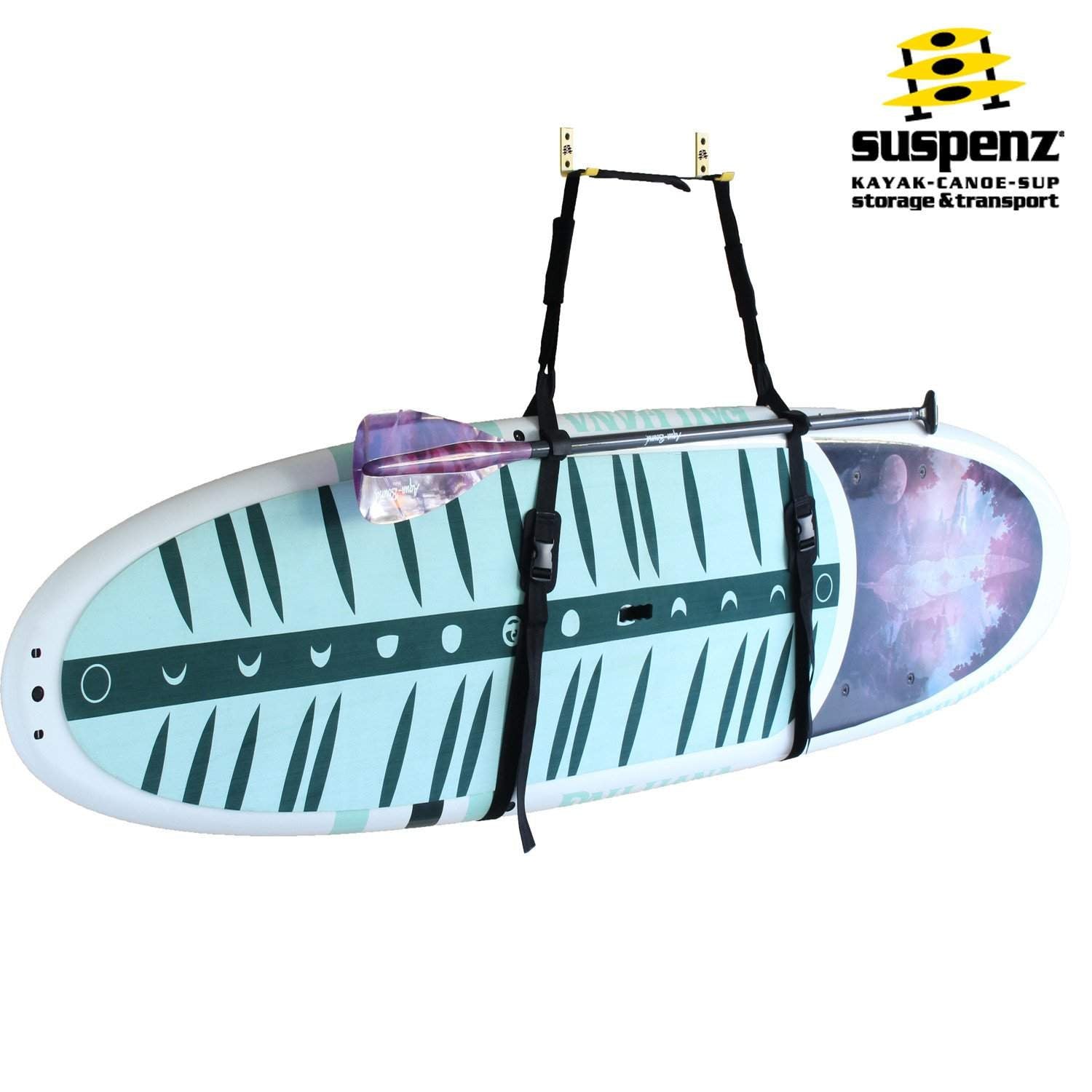 Paddleboard with carrying straps suspended horizontally showing decorative pattern and transport system