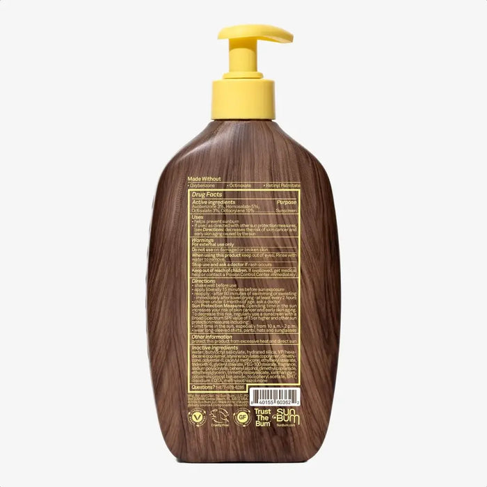 Brown pump bottle sunscreen lotion with yellow dispenser showing back label with ingredients and directions