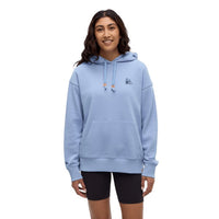 Light blue pullover hoodie with drawstrings and front pocket on model