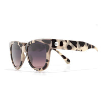 Cat-eye sunglasses with tortoiseshell frame and dark gradient lenses, three-quarter view