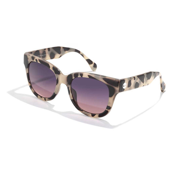 Tortoiseshell pattern sunglasses with purple gradient lenses on white background