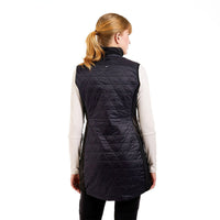 Black quilted vest with diamond pattern worn over long sleeve shirt, back view
