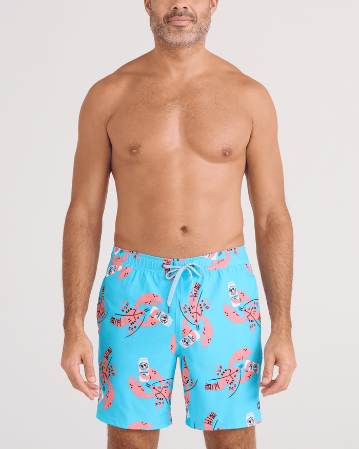 Men's swim trunks in turquoise blue with pink lobster print, front view with drawstring waist