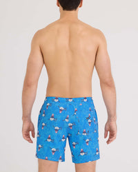 Men's swim trunks back view, blue with patriotic shark pattern, mid-thigh length
