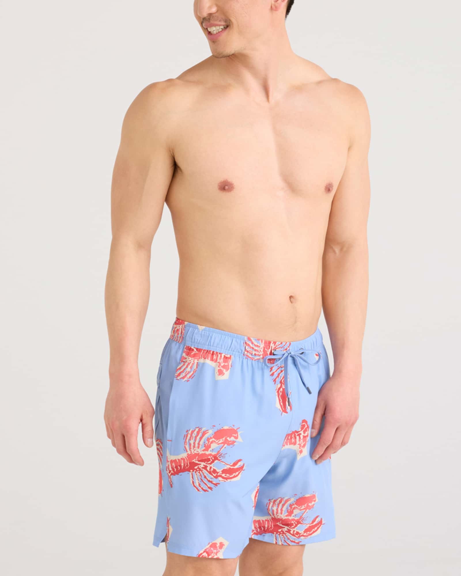 Men's swim trunks in light blue with red lobster print, front view with drawstring waist