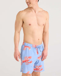 Men's swim trunks in light blue with red lobster print, front view with drawstring waist