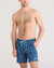 Men's navy blue swim shorts with nautical print pattern and light blue drawstring, front view
