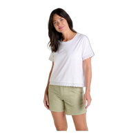 White short-sleeve tee with lace trim details on sleeves and hem, worn with green shorts