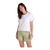 White short-sleeve tee with lace trim details on sleeves and hem, worn with green shorts