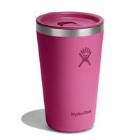 Pink insulated tumbler with press-in lid, angled view showing brand logo embossed on side