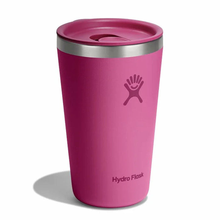 Pink insulated tumbler with press-in lid, angled view showing brand logo embossed on side