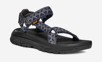 Outdoor sport sandal with navy grey camouflage straps and black sole, side angle view