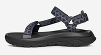 Sport sandal with adjustable straps in navy and grey pattern, side profile view