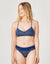Navy blue striped bikini bottom with white horizontal lines, modeled on woman