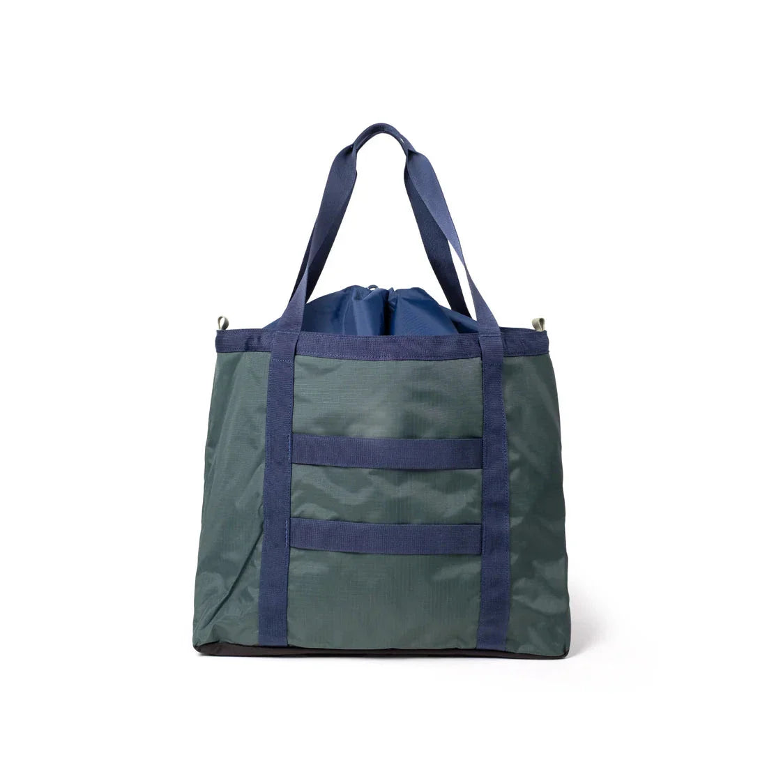 Large utility tote bag with green body, navy straps, drawstring top closure and front pocket