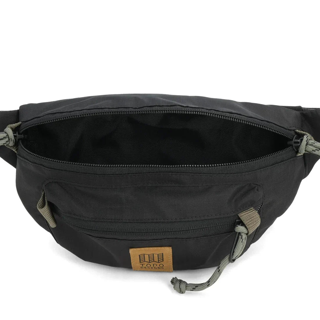 Black waist pack with multiple zippered compartments and adjustable olive green straps, main compartment open