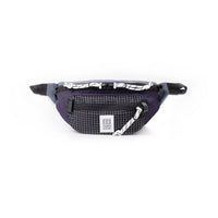Purple waist pack with black grid pattern front pocket and white rope drawstring