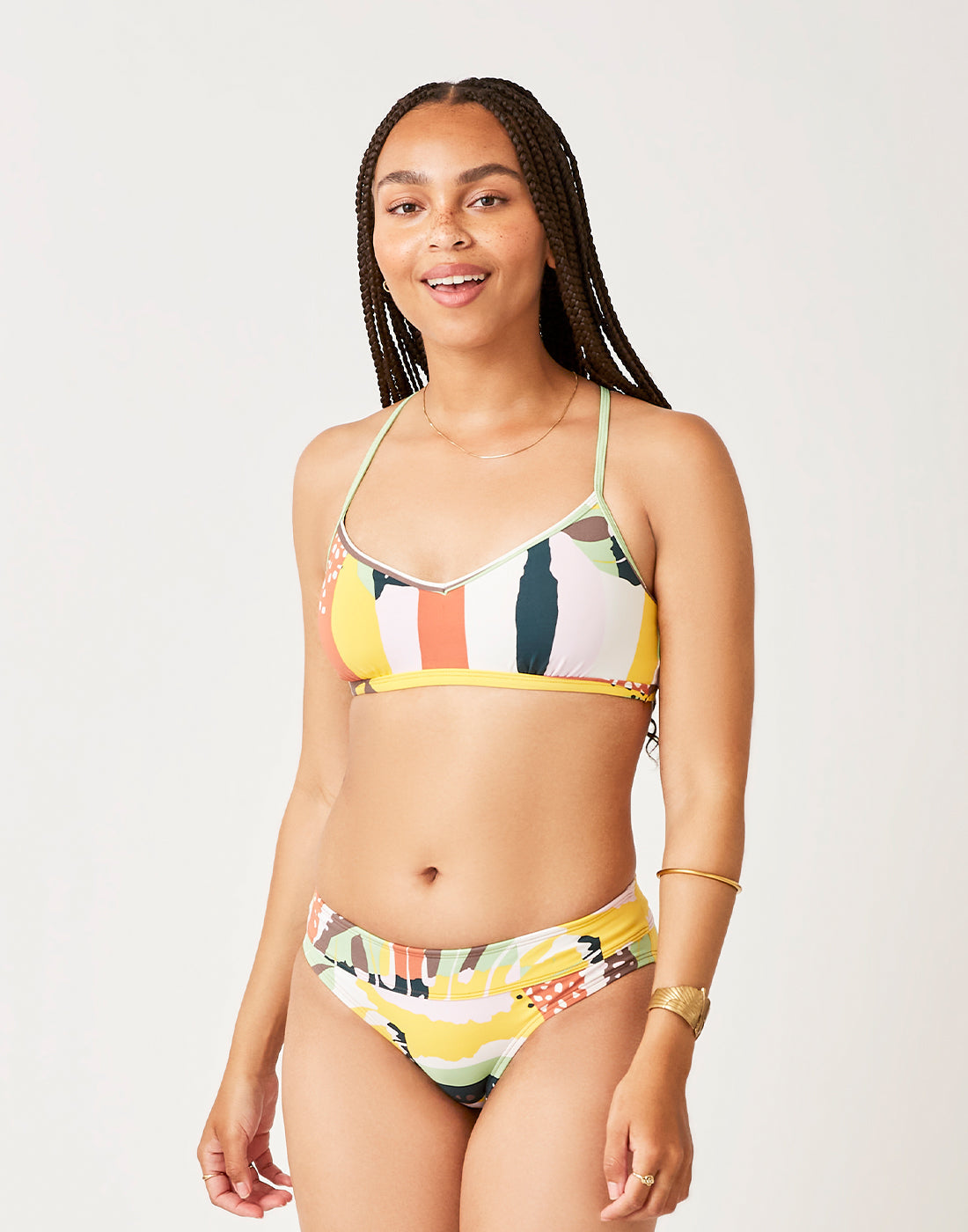 Bikini bottom with colorful abstract print pattern, mid-rise cut with side details