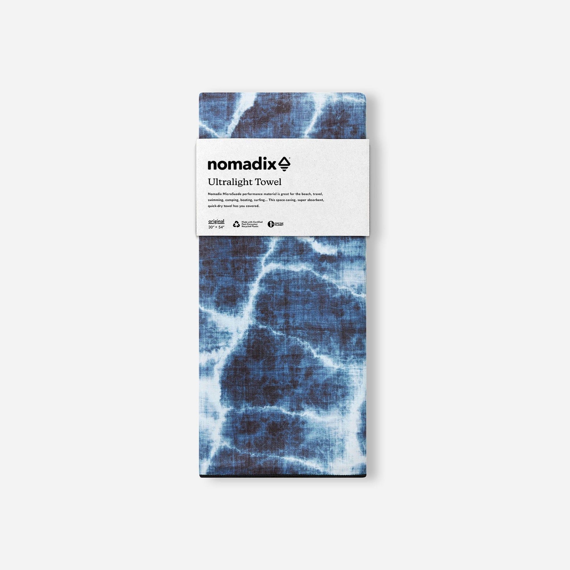 Blue tie-dye patterned ultralight travel towel in packaging with white label
