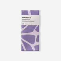 Purple patterned ultralight towel in packaging with abstract flowing design