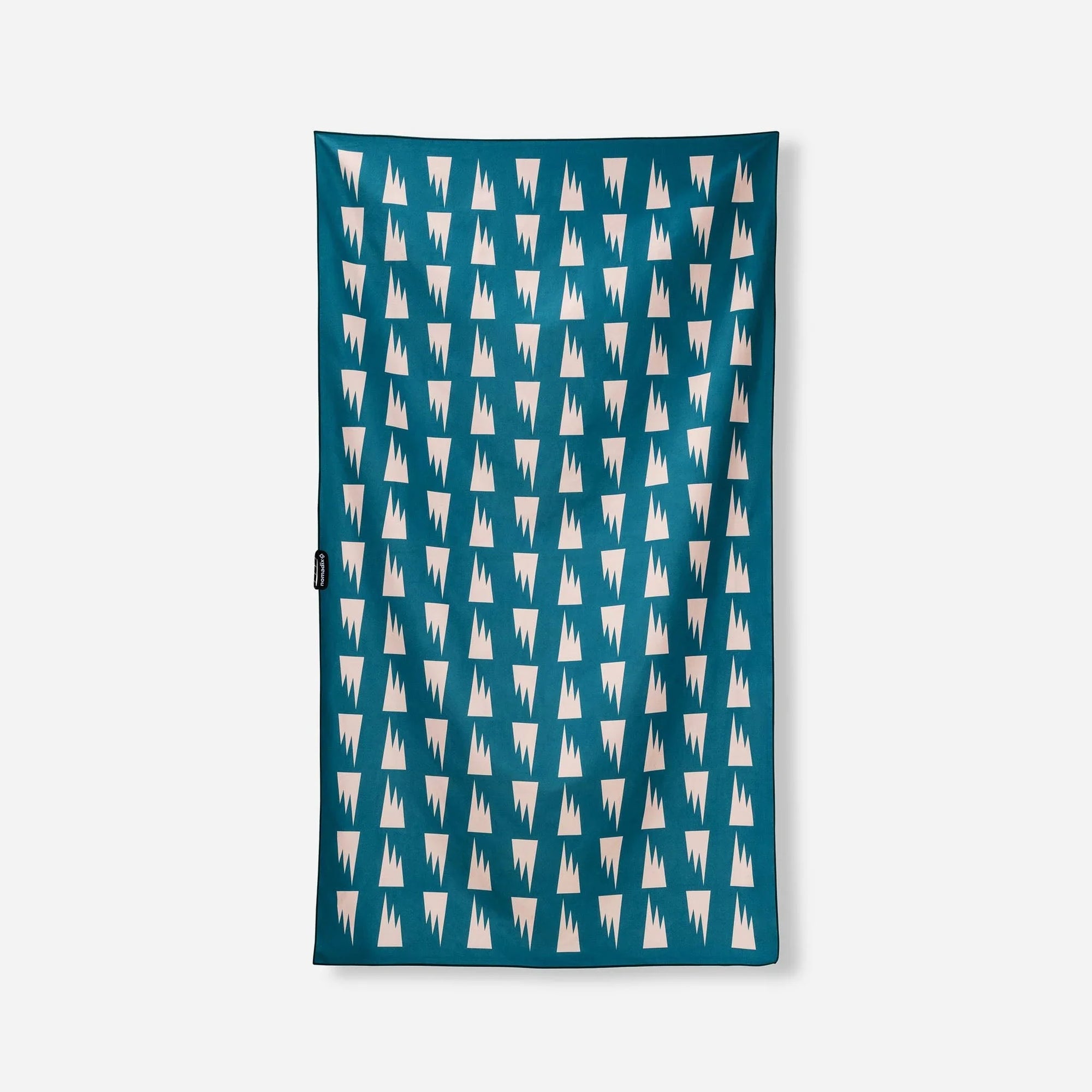 Teal microfiber towel with geometric triangle pattern displayed flat against white background