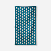 Teal microfiber towel with geometric triangle pattern displayed flat against white background
